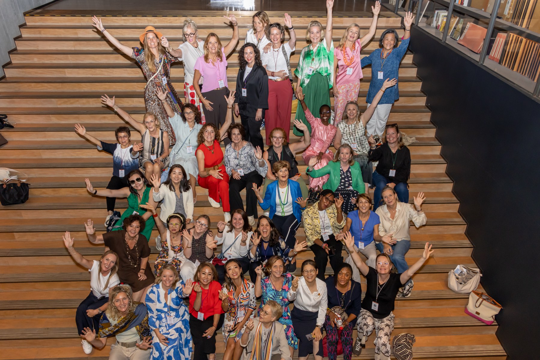 Women entrepreneurs gathered on a staircase in Shenzhen